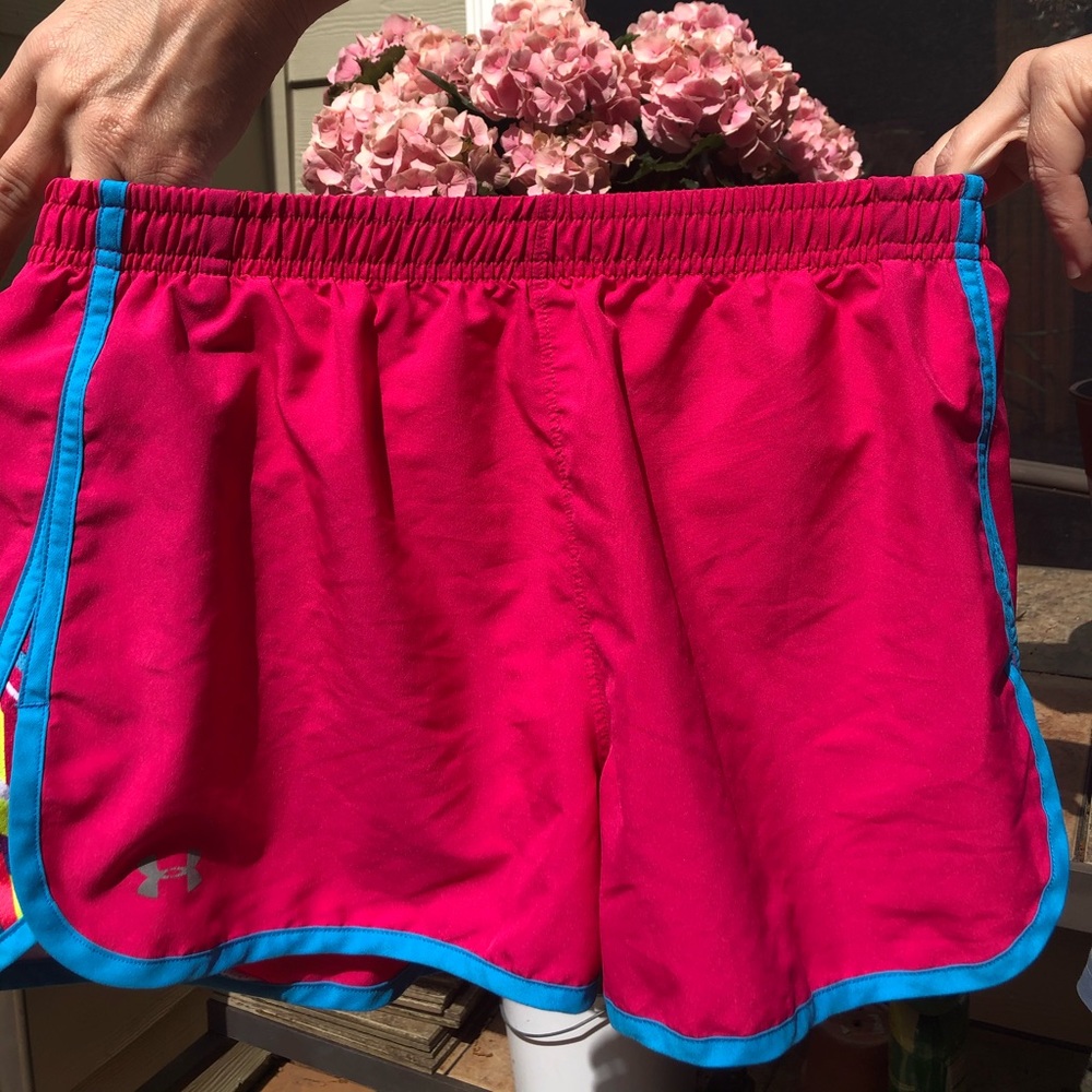 Pink Under Armour shorts.